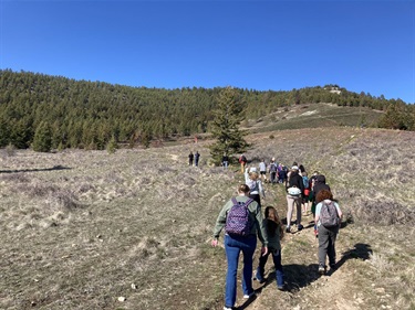 Students hike up a trail on Mount Helena.