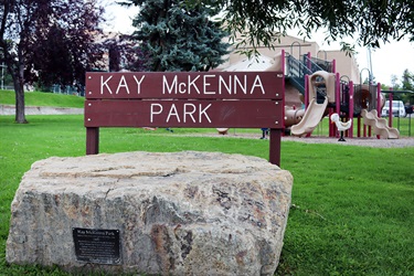 Decorative rock and wood sign at Kay McKenna Park.