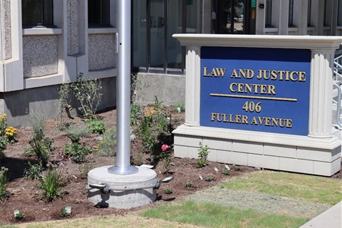 Sign and landscaping in front of Helena's Law and Justice Center.